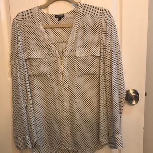 White blouse black polka dots and gold zipper